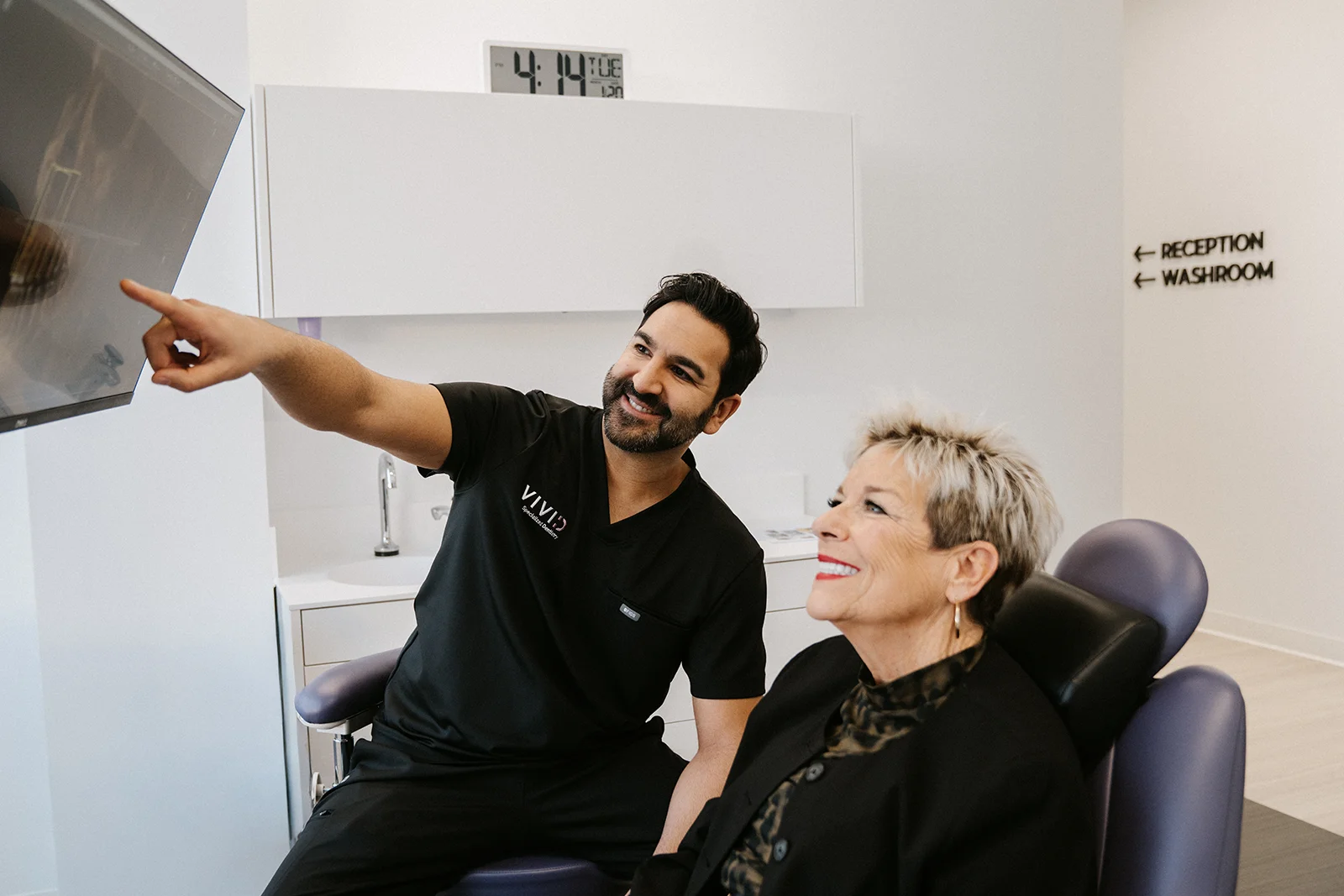 Doctor and patient looking at a monitor