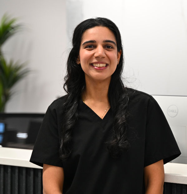 Dr. Alisha Amlani, Prosthodontist at Vivid Specialized Dentistry.
